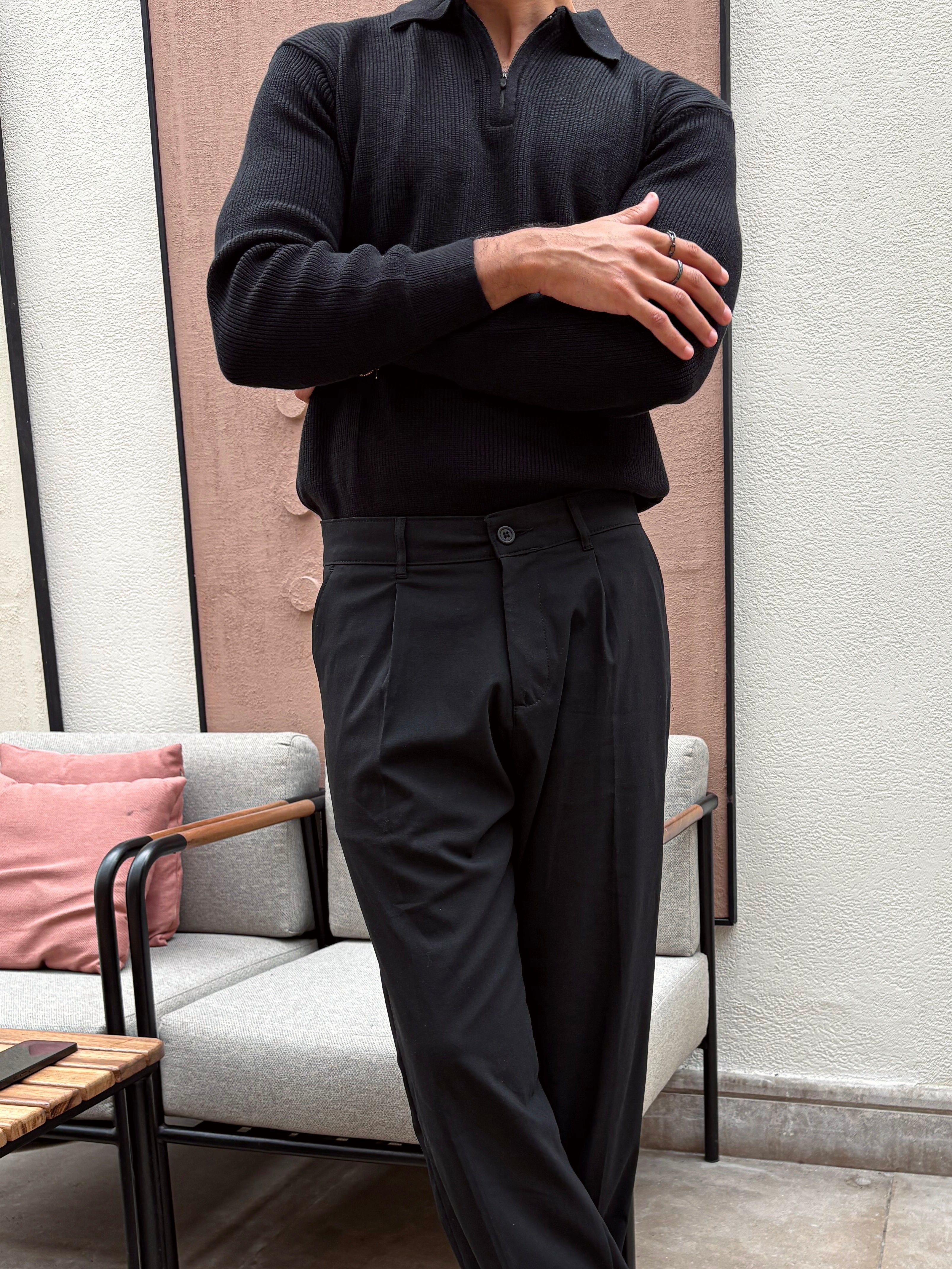Black knitted quarter-zip polo