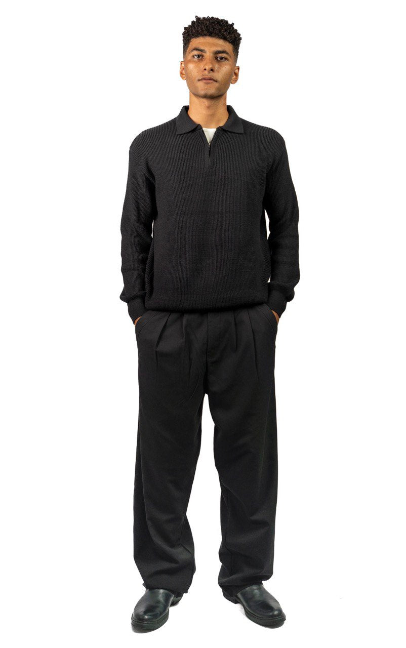 Black knitted quarter-zip polo