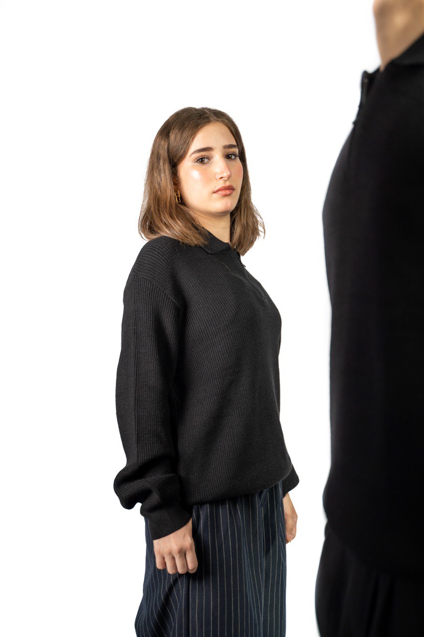 Black knitted quarter-zip polo